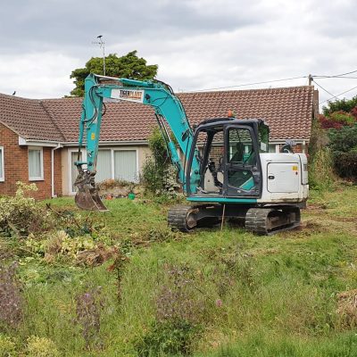 A Thomas Brothers Digger starting Groundworks in Stroud